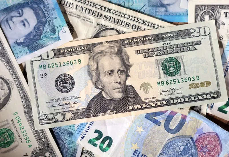 Dollar Under Pressure as U.S. Economic Worries Mount and Fed